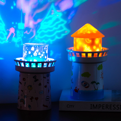 2022 Creative Gift 360 degree Rotating Watchtower Projection lamp 1500mAh Rechargeable sleeping Night Light Music Box Fo